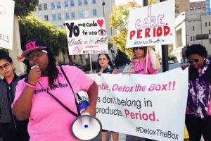 Women rally outside of P&G headquarters